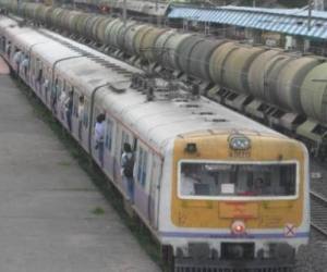 People traveling in an overcrowded train