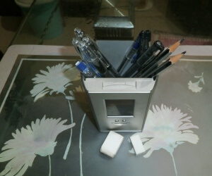 A few pens and pencils