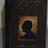 Cover of a book, which contains the story 'The Blood-Stained Sapphire'